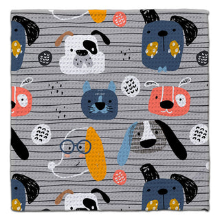 Dog-themed eco-friendly waffle weave washcloth with colorful illustrated puppy faces by CJ Bella