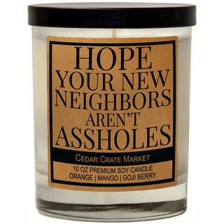 New Neighbors Candle with a humorous label from Cedar Crate Market on a white background
