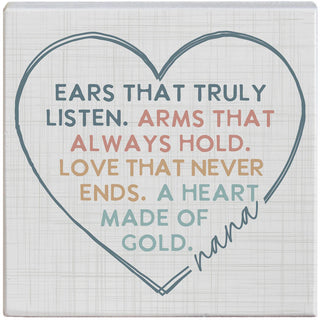 Ears That Listen Nana Wood Sign by Sincere Surroundings — 5.25" square pine wood sign with a linen-textured background featuring a hand-drawn heart outline and the colorful sentiment "Ears that truly listen. Arms that always hold. Love that never ends. A heart made of gold." with "nana" in script at the bottom
