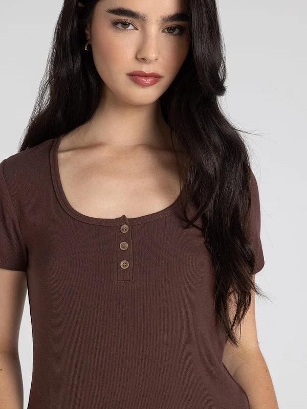 Evanore Top — close-up of quarter-button front closure detail