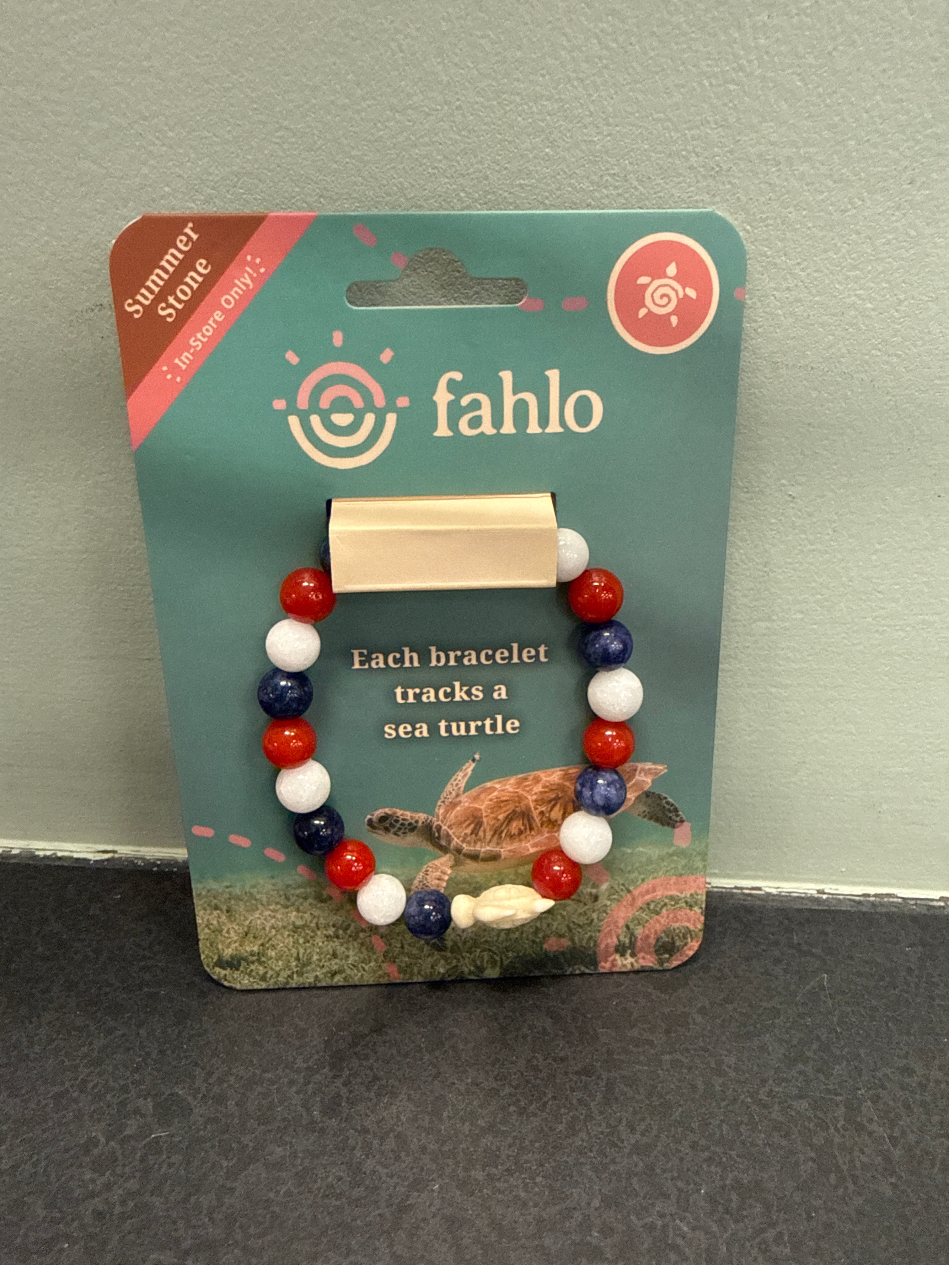 Fahlo Journey Summer Stone Bracelet with red, white, and blue beads that tracks a real sea turtle