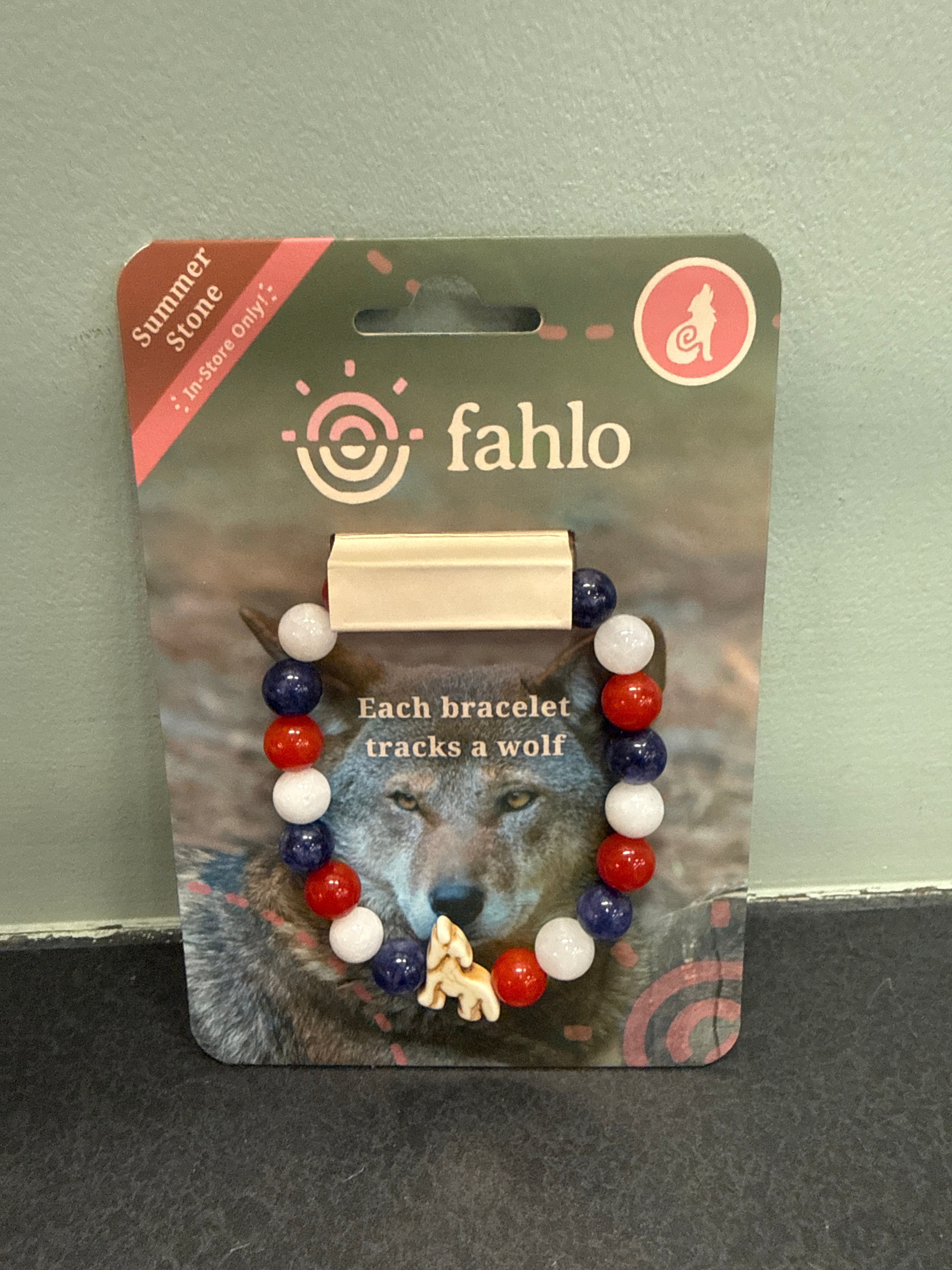 Fahlo Scout Summer Stone Bracelet with red, white, and blue beads that tracks a wolf