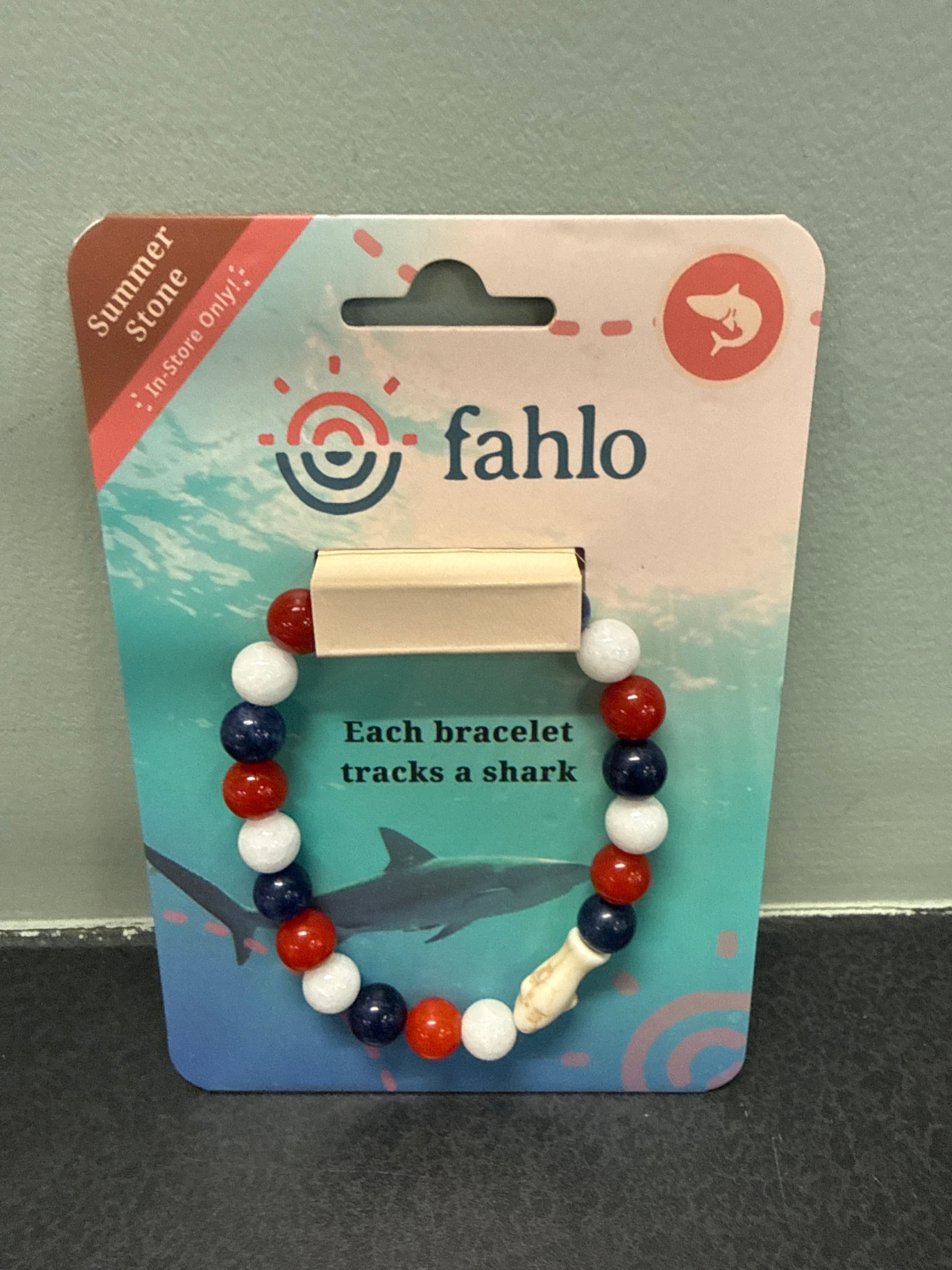Fahlo Voyage Summer Stone Bracelet with red, white, and blue beads that tracks a real shark