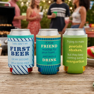 A True Friend funny can sleeve holding a canned drink at an outdoor barbecue with other humorous drink can sleeves.