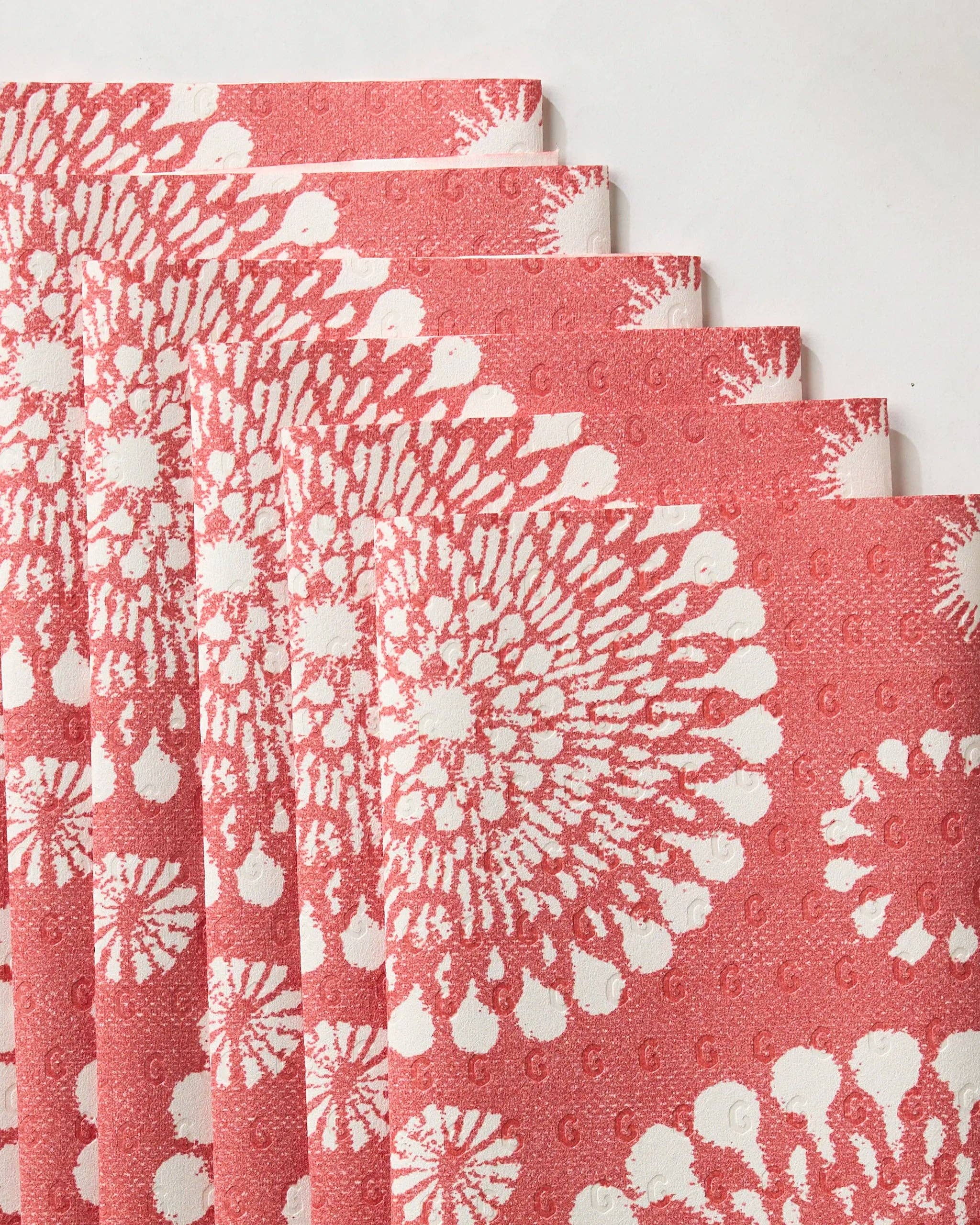 Geometry Freedom Sparks Bright reusable not paper towels with patriotic red and white firework-inspired pattern close up