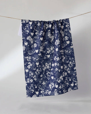 Geometry Midnight Posy Tea Towel — navy Geoweave™ kitchen towel with white floral and heart pattern, 18x30 inches, made from post-consumer recycled materials
