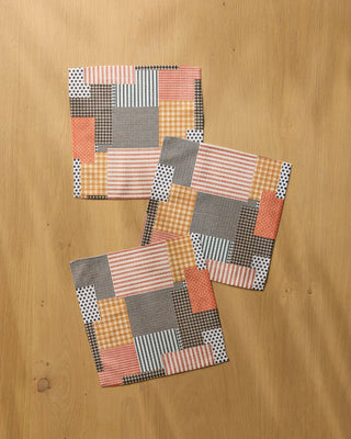 Geometry Patch and Pumpkin Dishcloth Set 3-pack — autumn patchwork Geoweave™ dishcloths with orange, brown, beige, and white stripes, polka dots, and gingham, 10x10 inches each
