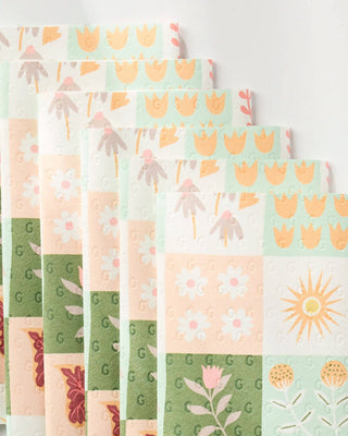 Close-up of Geometry Patchwork Garden reusable not paper towels set with pastel floral patchwork design
