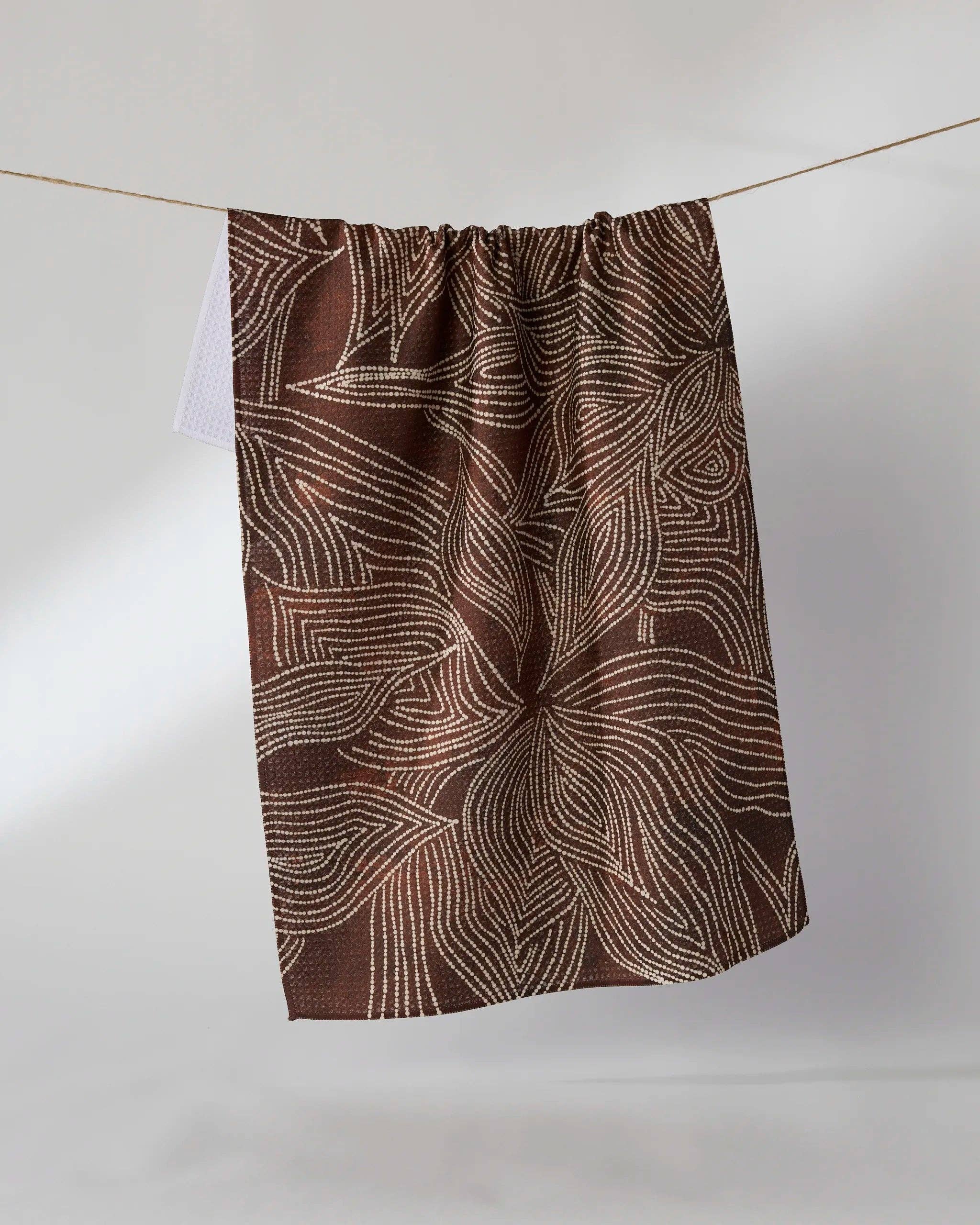 Geometry Pearl Botanical Tea Towel — brown Geoweave™ kitchen towel with white dotted botanical print, 18x30 inches, made from post-consumer recycled materials
