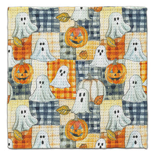 Halloween-themed eco-friendly washcloth with ghosts and pumpkins on a checkered background