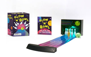 Glow 'N' Bowl mini desktop bowling game with glow-in-the-dark lane, bowling pins, ball, lights, and mini guidebook