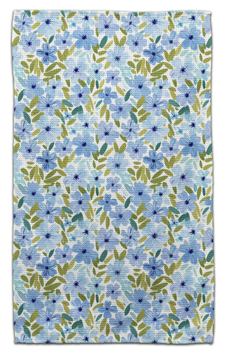 Eco-friendly waffle weave kitchen towel featuring delicate watercolor light blue flowers with green leaves on a white background.