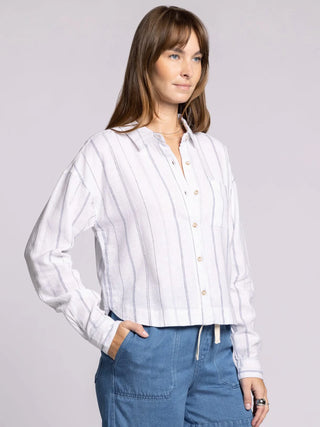 woman wearing white and blue striped cropped linen blend button front shirt