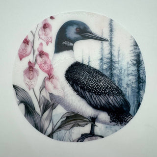 Silicone jar opener featuring Minnesota loon bird and lady slipper flower design