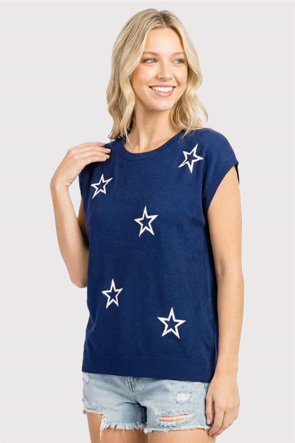 woman wearing navy short sleeve sweater with embroidered stars on front