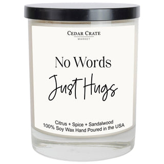 No Words Just Hugs soy candle by Cedar Crate Market featuring a comforting citrus, spice and sandalwood fragrance in a reusable glass jar.