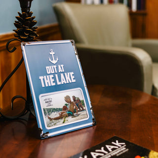 Rustic Out at the Lake 6x4 metal picture frame with embossed anchor design for lake house and cabin décor.