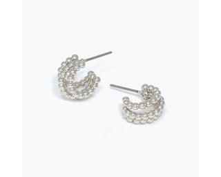 Triple-row polished silver ball bead mini huggie hoop earrings by Periwinkle — dainty, lightweight silver hoops perfect for stacking and everyday wear
