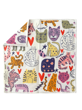 Double-sided microfiber waffle weave washcloth featuring colorful illustrated cats, hearts, and playful designs on both sides.