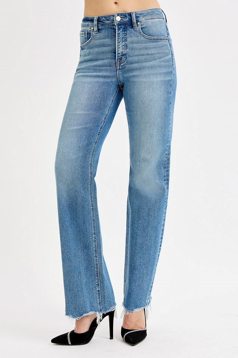 Risen high rise wide leg jeans with raw hem and medium wash denim