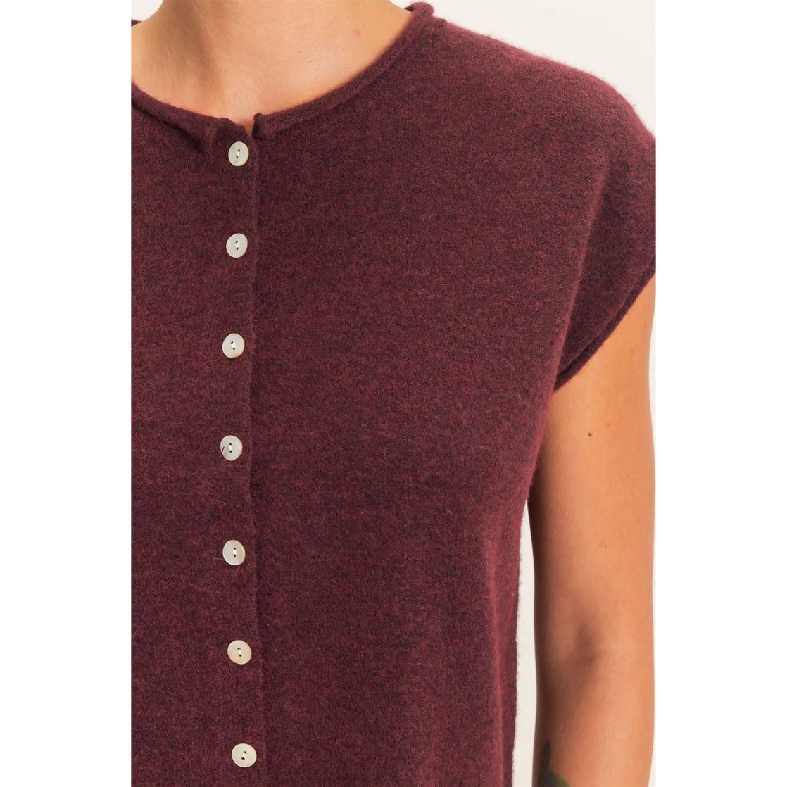 Rolled Edge Button Front Sweater Vest in dark cherry — women's sleeveless button-front sweater vest with rolled crew neckline and ribbed hem - close up of buttons and neck