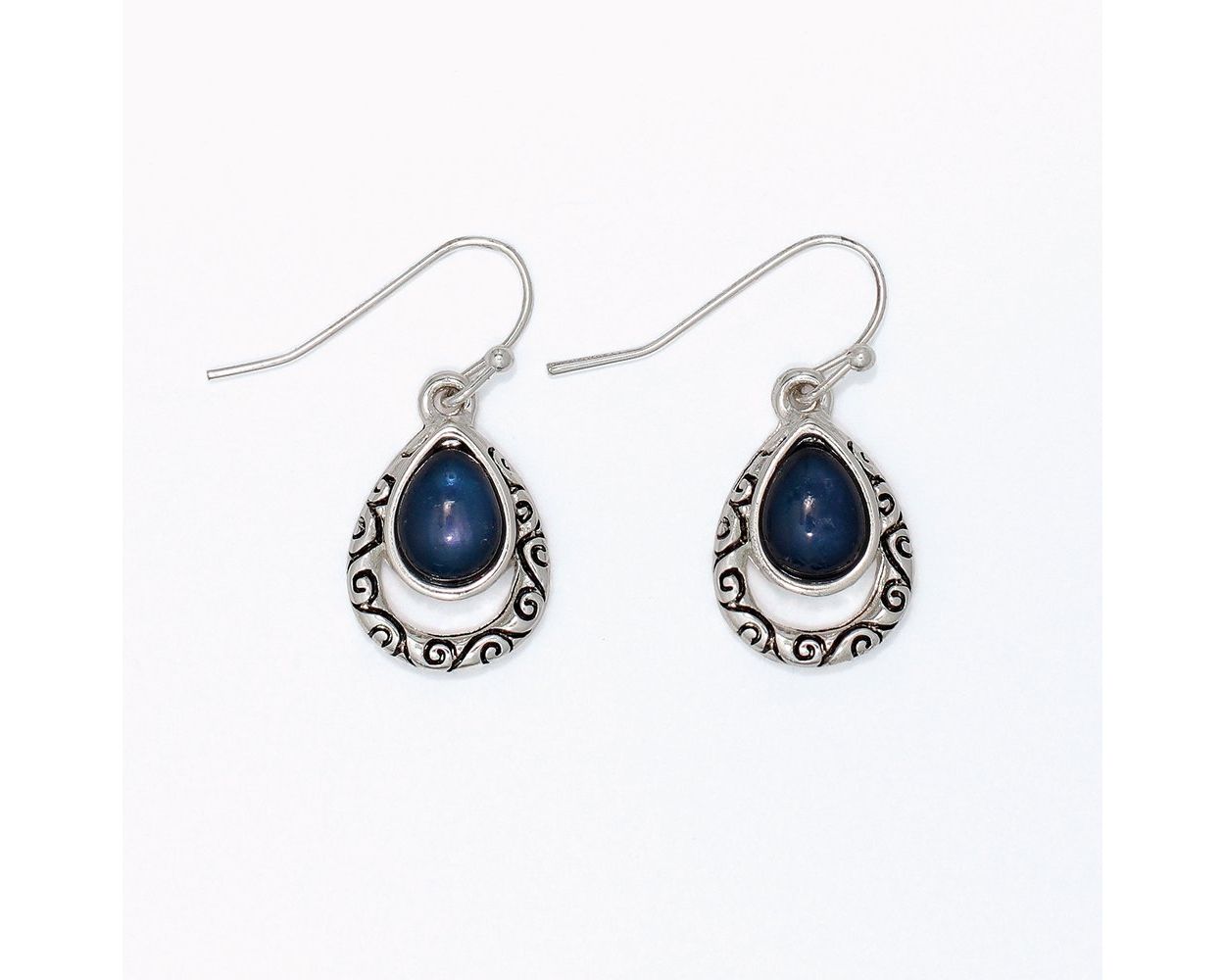 Antique silver filigree teardrop drop earrings with open scrollwork frame and deep navy cabochon inlay by Periwinkle
