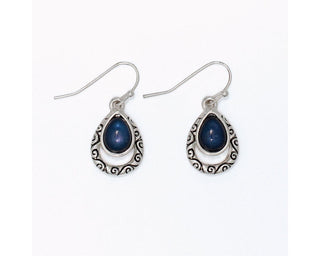 Antique silver filigree teardrop drop earrings with open scrollwork frame and deep navy cabochon inlay by Periwinkle

