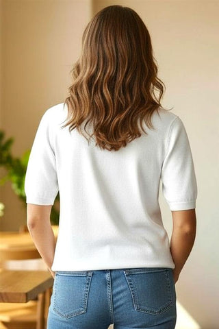 woman wearing white crew neck half sleeve lightweight sweater back view