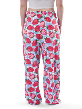 Pajama pants with strawberry pattern on a white background