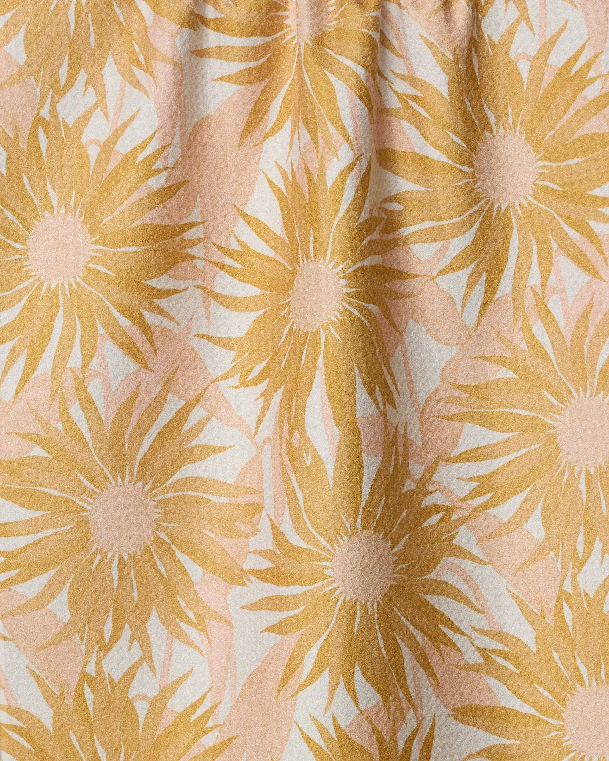 Golden floral eco-friendly kitchen tea towel by Geometry close up