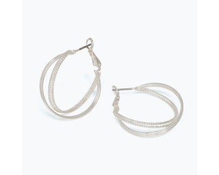 1.25" textured silver triple-strand twist hoop earrings with smooth and textured bands by Periwinkle — classic, lightweight silver hoops for everyday wear
