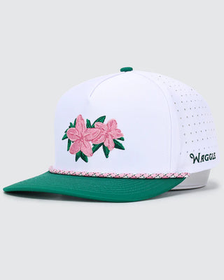 Waggle Azaleas golf snapback hat with pink embroidered flowers and green brim