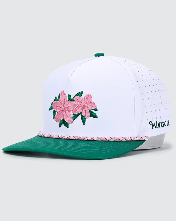 Waggle Azaleas golf snapback hat with pink embroidered flowers and green brim