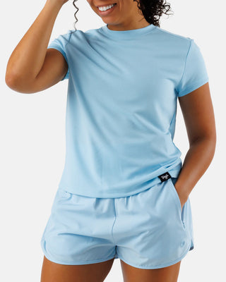 Women’s sky blue short sleeve performance athletic shirt by Waggle with lightweight breathable fit
