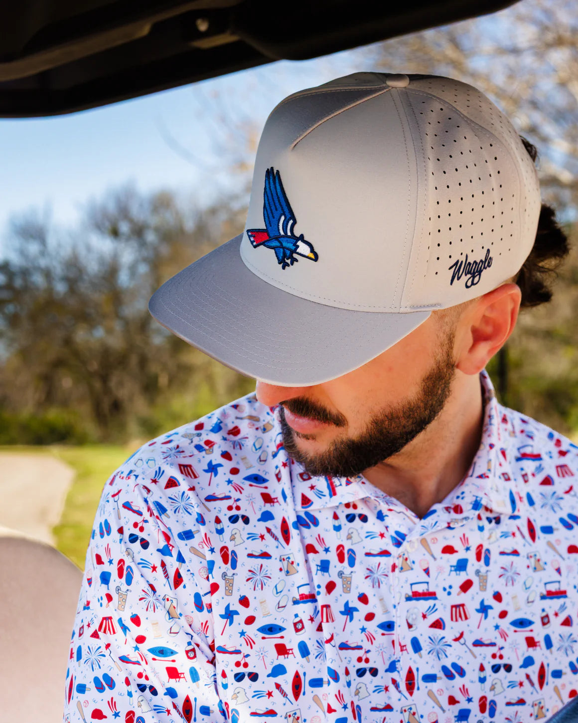 Man wearing Waggle Patriot snapback hat with embroidered eagle logo