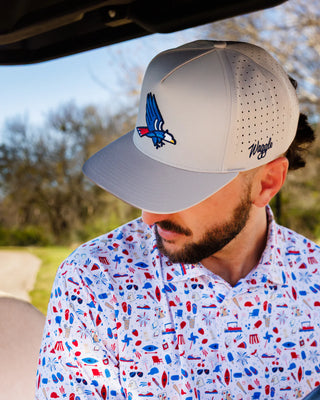 Man wearing Waggle Patriot snapback hat with embroidered eagle logo