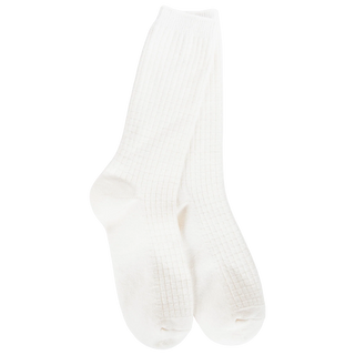 Women's white waffle-knit crew socks featuring a soft textured design for everyday comfort.