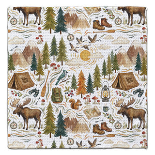 Woodland camping eco-friendly washcloth with nature-themed illustrations including trees, animals, and camping gear.