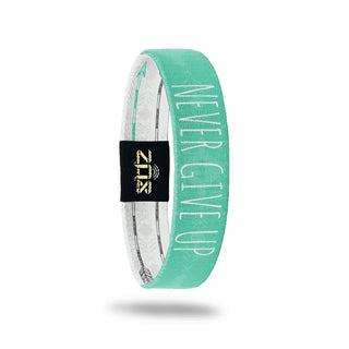 Turquoise wristband with 'Never Give Up' text on a white background