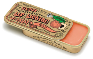 Lip Licking peach flavored organic natural lip balm in vintage slider tin packaging