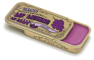 Lip Licking grape flavored organic natural lip balm in vintage slider tin packaging